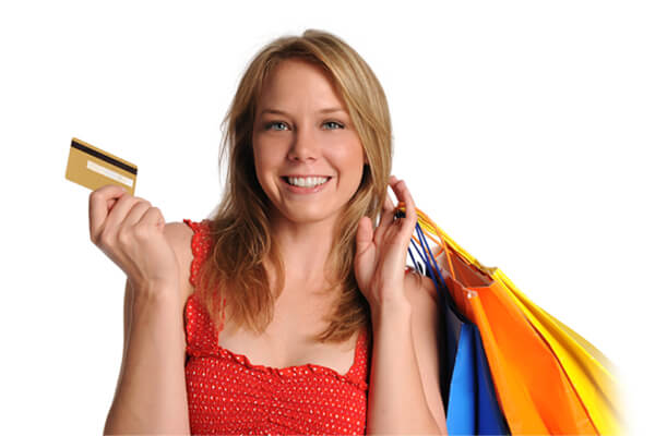 woman with credit card and bags